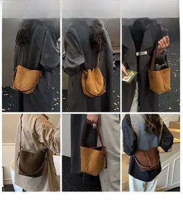 Multiple views of a matte suede bucket bag in brown tones with an adjustable strap