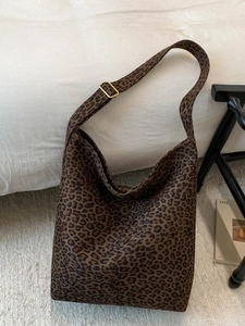 Large leopard print canvas hobo bag with adjustable wide strap for casual commuting
