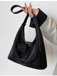 Minimalist black faux leather shoulder tote bag with vintage matte finish for women