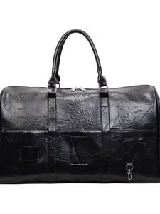 Grand sac de voyage noir avec texture plissée brillante et doubles poignées rondes