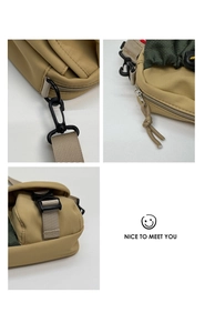 Macro view of hiking bag buckle, zipper detail and durable nylon fabric in khaki and green