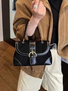 Retro black faux suede saddle bag with gold buckle and white contrast stitching detail