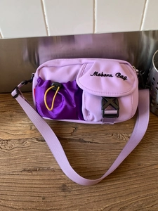 Vintage American workwear style purple nylon crossbody bag with adjustable strap