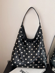 Vintage black leather hobo bag with silver rivets and spacious shoulder strap design