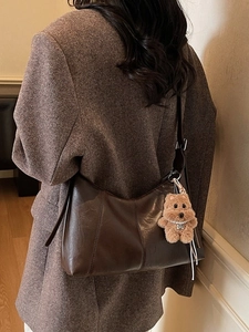 Retro dark brown underarm bag in oily faux leather with cute plush bear pendant