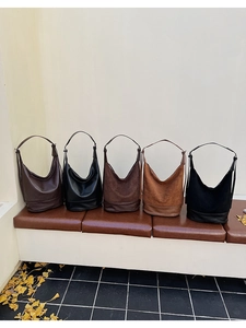Detailed view of minimalist large capacity shoulder bags in five autumn-themed colors