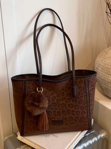 Chic leopard print large tote bag in brown suede texture with tassel and plush pompom charm