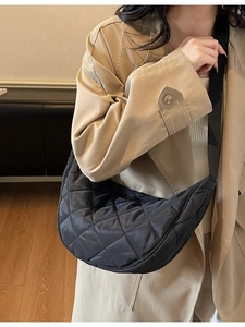 Black quilted crescent nylon crossbody bag with adjustable strap for women casual fashion