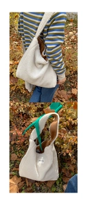 Detail of white sherpa tote bag with soft fleece texture and warm brown lining detail