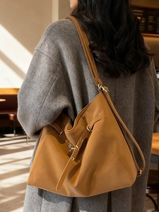 Minimalist vintage caramel leather large tote bag with elegant strap and ring detail