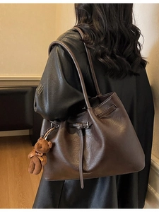 Retro dark brown oversized tote bag with pleated detail and cute teddy bear charm