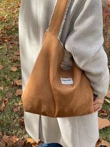 Brown suede tote bag with fleece lining and OUR FAVE label for autumn winter fashion