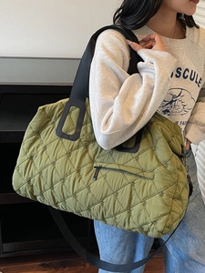 Olive green quilted sports bag with diamond pattern and large capacity for travel