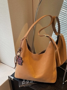 Caramel brown vintage hobo bucket bag with leopard bear charm for women's commuting