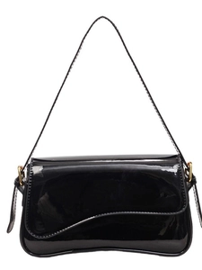 Black patent leather shoulder bag with glossy finish and asymmetric wavy flap design