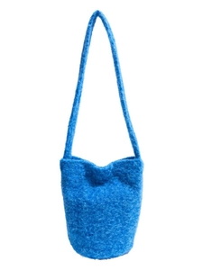 Blue fuzzy fleece bucket bag with plush shoulder strap and minimalist cylindrical design