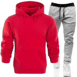 Detail of red drawstring hoodie and light grey fleece joggers set for men