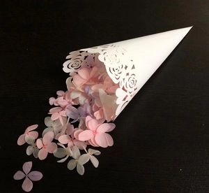 Detailed laser-cut rose hollow paper cone filled with pink and purple dried flower petals