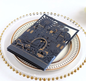 Detail of 3D pop-up wedding card featuring a gold foil castle and royal carriage