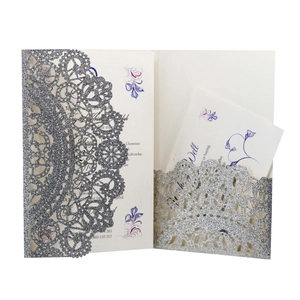 Elegant laser-cut silver glitter wedding invitation set with purple floral inner cards