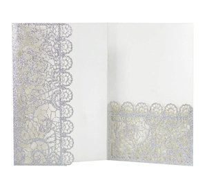 Detail of silver glitter laser-cut lace wedding invitation with pocket and folding design