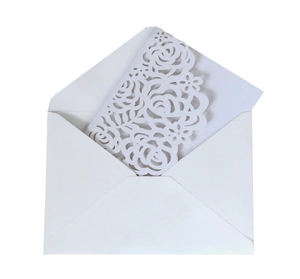 Elegant laser-cut white rose invitation set with envelope for wedding or greeting cards