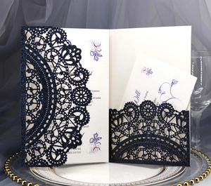 Detailed laser cut lace pocket wedding invitation with navy blue glitter and floral insert