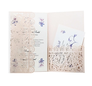 Detailed laser-cut lace wedding invitation set with floral hollow pattern and white insert cards