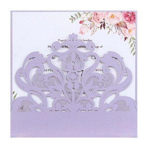 Detail of laser-cut lace wedding invitation in lavender glitter paper with floral inner card