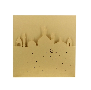 Champagne gold laser-cut invitation card with moon and castle silhouette design