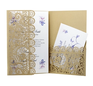 Golden laser-cut lace wedding invitation set with floral inner card and white envelope