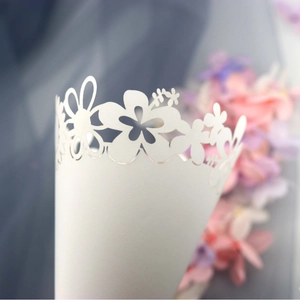 Elegant white laser-cut confetti cone with sunflower patterns for wedding party decor