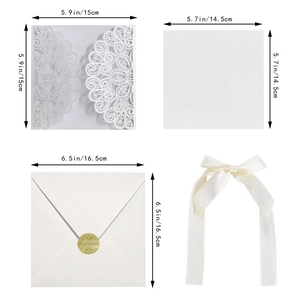Detailed size chart of laser-cut heart invitation set with white envelope and ribbon