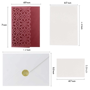 Detailed dimensions of laser-cut burgundy invitation suite with gold seals and envelopes