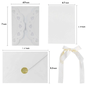 Detailed view of laser-cut wedding invitation set with dimensions and ivory envelope stickers