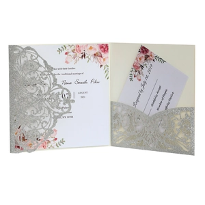 Elegant laser-cut silver glitter wedding invitation with floral inner card and RSVP card