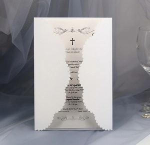 Elegant white laser-cut wedding invitation card with pearlescent inner page and cross