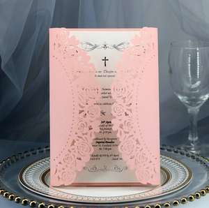 Macro view of laser-cut rose hollow invitation with elegant printing details
