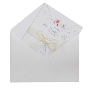 Laser cut wedding invitation with floral inner card, silk ribbon and white envelope