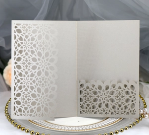 Detailed laser-cut floral pattern on elegant champagne pocket wedding invitation card
