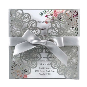 Laser-cut peacock lace wedding invitation set with silver glitter and ribbon