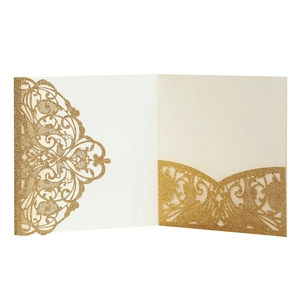 Intricate laser-cut floral details on gold glitter wedding invitation pocket cover