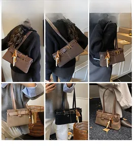 Sac à bandoulière vintage de grande capacité avec ceinture métallique et perles en bois