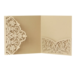 Detailed laser cut floral vine pattern on premium pearlescent champagne gold invitation