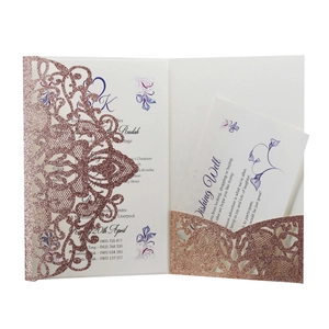 Rose gold laser cut wedding invitation set with glitter floral patterns and matching cards