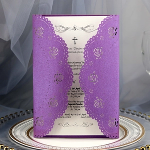 Detail view of purple laser cut rose floral invitation card with pearlescent finish