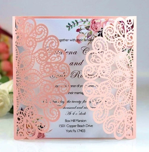 Laser cut peach wedding invitation with elegant floral insert and lace hollow pattern