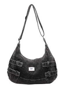Japanese workwear style black washed denim hobo bag with adjustable strap and metal buckles