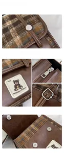 Détails de sac en cuir vintage avec boucles métalliques et fermeture magnétique durable