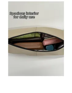 Large capacity crescent bag interior showing daily essentials and storage space